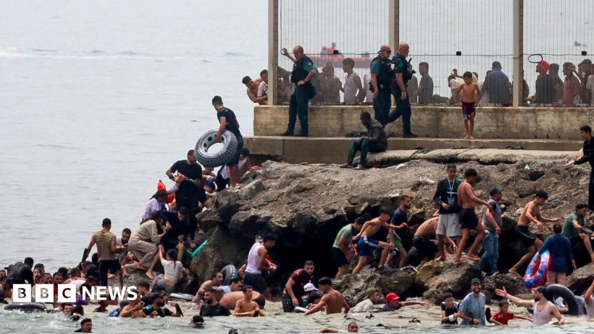 Hundreds of Migrants Surge into Spanish Enclave of Ceuta, Triggering Humanitarian and Security Concerns