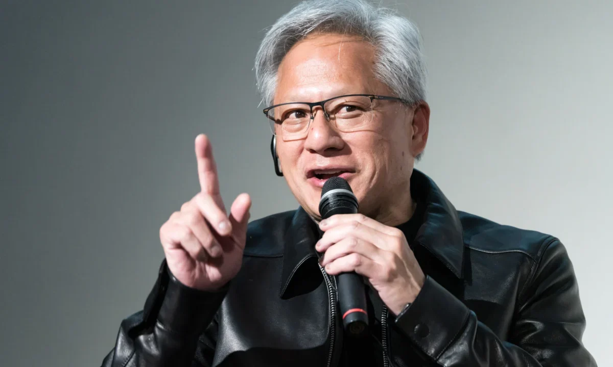 Nvidia CEO Jensen Huang Takes President Trump’s Call on Stage at All-In Conference, Sparks Discussion on AI Pacing and Future.